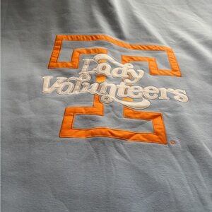 Light blue and Orange Lady Volunteers fleece throw 80” x 54”